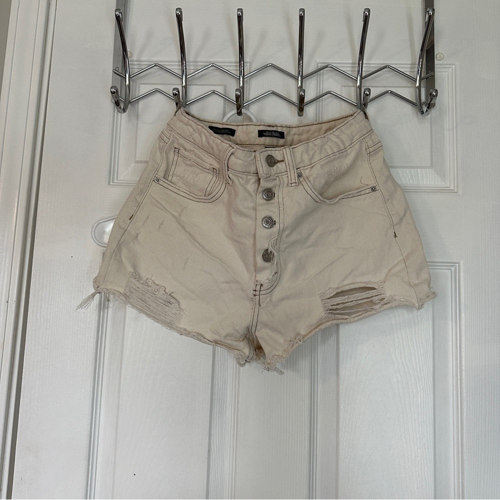 Cream colored high waisted jean shorts